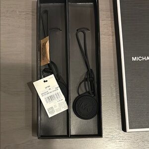 Michael Kors black AirTag holder NWT